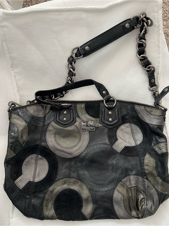 Coach Handbags - Coach Black Patchwork Leather Shoulder Bag with Circular Accents